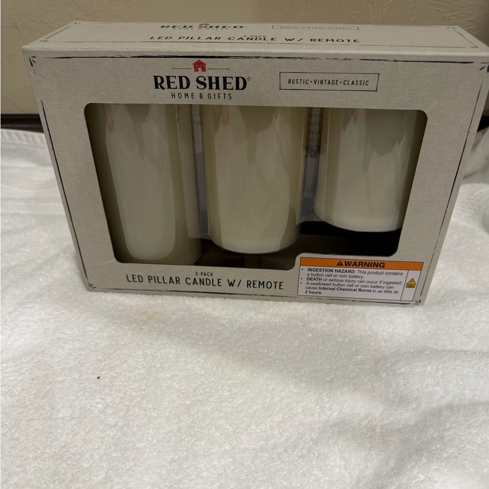 New in Box Red Shed Remote Control Candle Set
